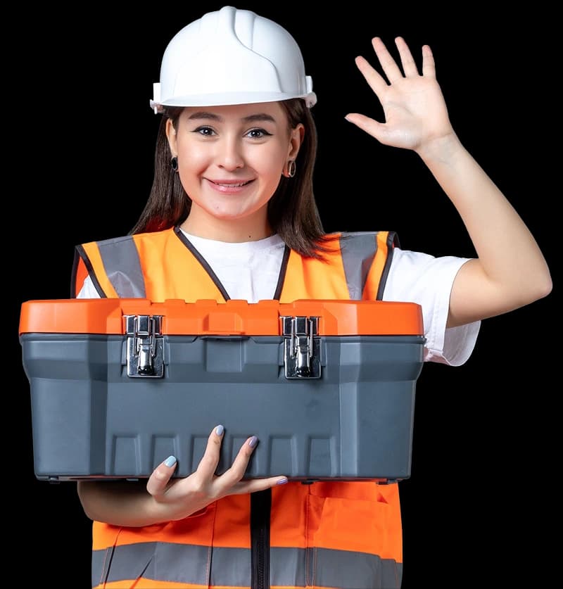 Juta Semangat team member with a construction toolbox